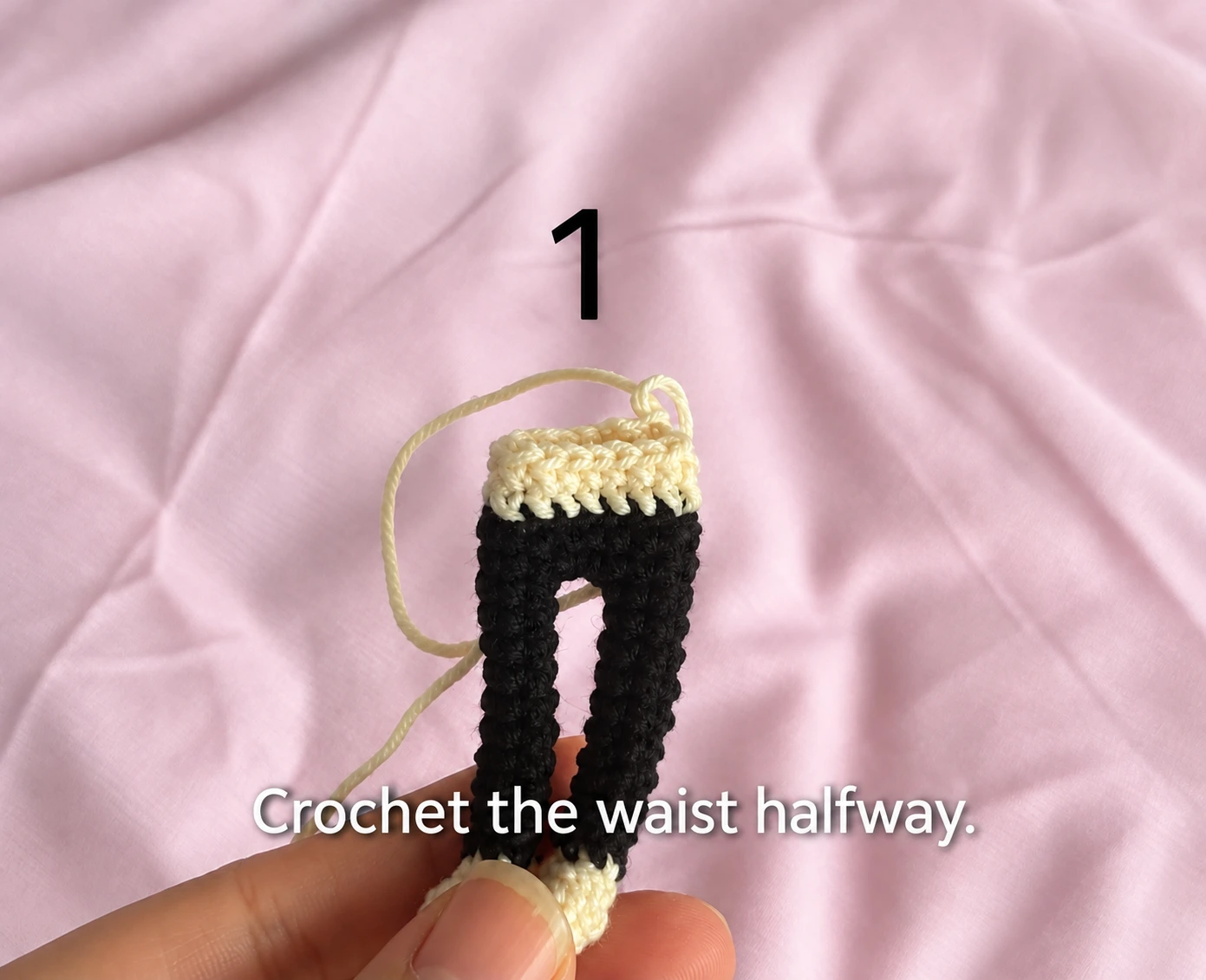 The waist is still open when the leg support is fitted. Compare the support with the actual crocheted legs before closing this access point.