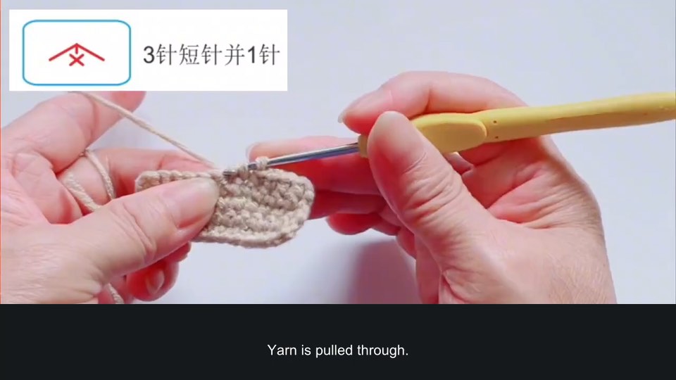 Combining stitches into one decrease — tutorial video frame