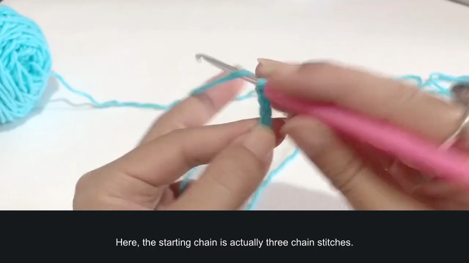 Double crochet from a starting chain — tutorial video frame