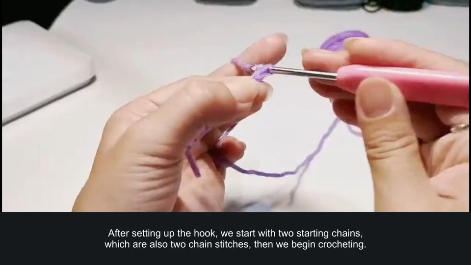 Half double crochet from a starting chain — tutorial video frame
