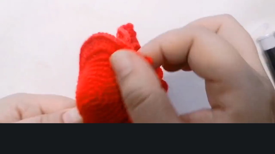 Crochet rose — final rose assembly — tutorial video frame